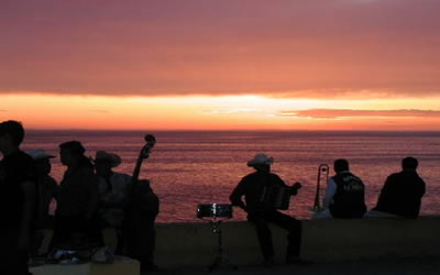 Band Playing on Beachat Sunset 